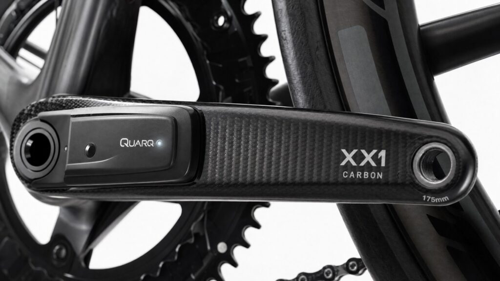 Carbon crank arm power meter on a road bike showing the strain gauge sensor pod