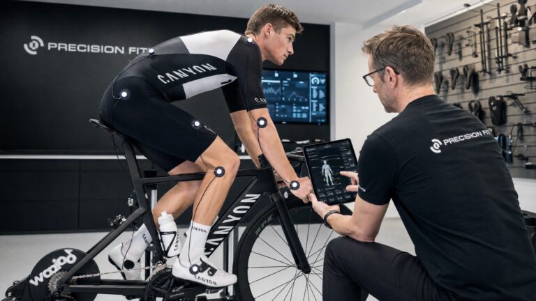 Professional bike fitting session with cyclist on smart trainer using advanced motion capture technology