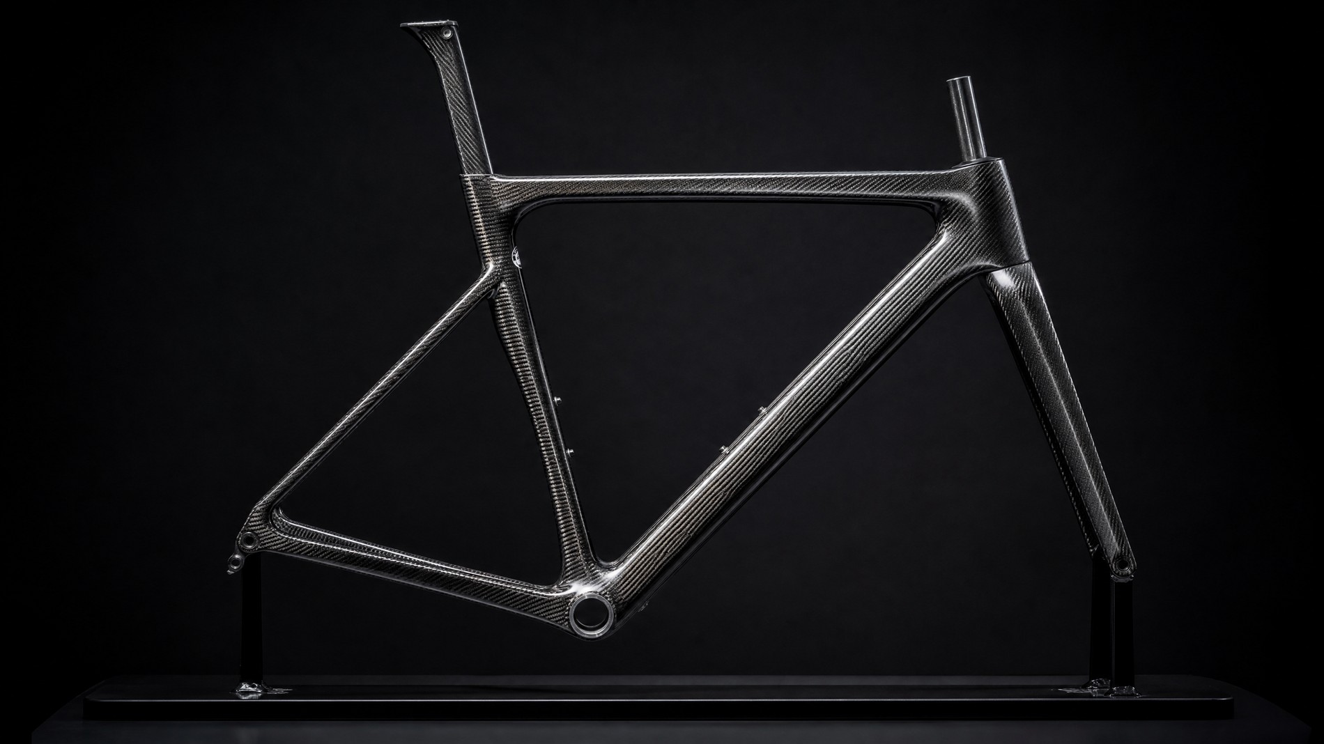 Close-up of a high-performance road bike carbon frame with aerodynamic design